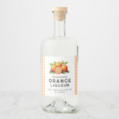 Zelfgemaakte oranje likeur met sinaasappels en bla likeurfles etiket (Voorkant)