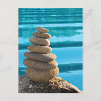 Zen stone tower with blue water postcard briefkaart