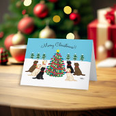 Zeven labradors en kerstboom feestdagen kaart