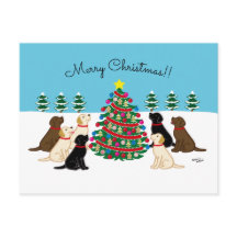 Zeven labradors en kerstboom