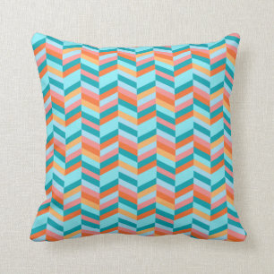 zigzag-chevron blauwgroen en oranje kussen