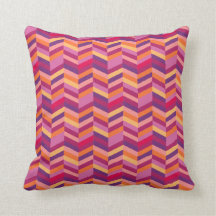 zigzag-chevron paarse en oranje gootkussens