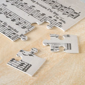 Zijn oog staat op de spuitmond. legpuzzel (Zijkant)