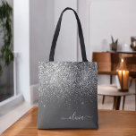 Zilver Grey Girly Glitter Sparkle Monogram Name Tote Bag<br><div class="desc">Charcoal Gray (Grey) en Silver Faux Sparkle en Glitter Elegant Monogram Book Bag. Deze Book Bag kan worden aangepast om uw initiaal en voornaam op te nemen en wordt gegeven als cadeau voor Kerstmis,  Sweet 16 Birthday,  Vrijgezellenfeest of een bruiloft.</div>