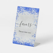 Zilveren feestartikelen in koningsblauw reclamebord met voetstuk (Voorkant)