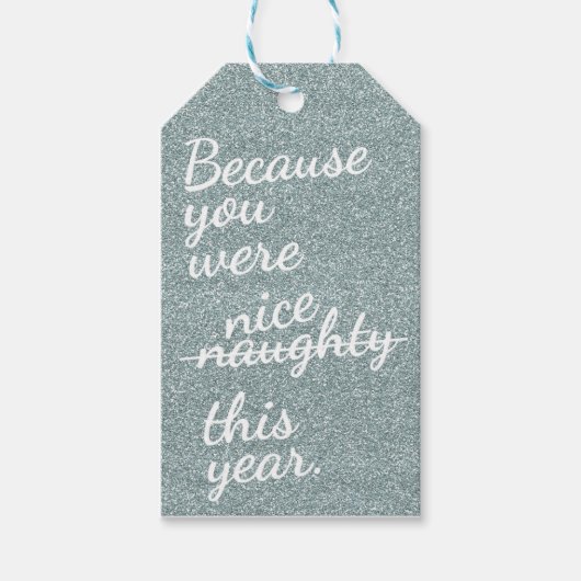 Zilveren glitter met "ondeugend of mooi" in het wi cadeaulabel (Voorkant)