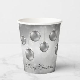 Zilveren grijze kerstballen op grijze bokeh papieren bekers