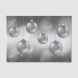 Zilveren grijze kerstballen op grijze bokeh tissuepapier