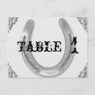 Zilveren Hoefijzer op witte huwelijkstafel nummer Briefkaart