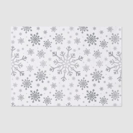  zilveren kerstsnowflakes op winterwit tissuepapier (Voorkant)