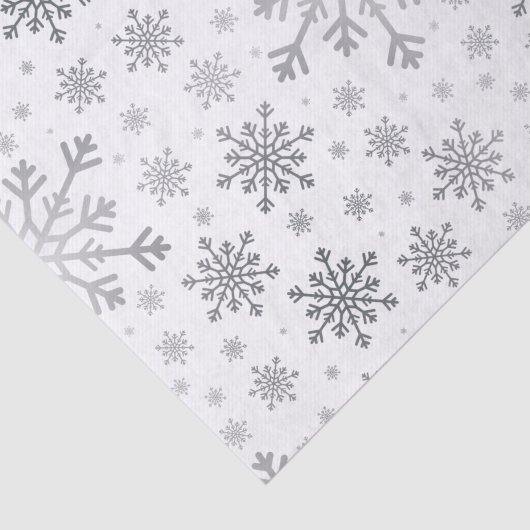 zilveren kerstsnowflakes op winterwit tissuepapier (Detail)