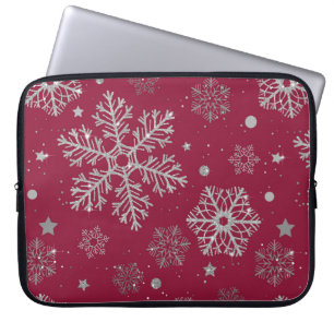 Zilveren sneeuwvlokken op donkerrood laptop sleeve