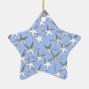 Zilveren sterren op bleek blauw keramisch ornament