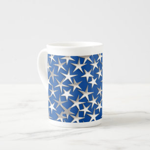 Zilveren sterren op kobalt blauw porselein kop