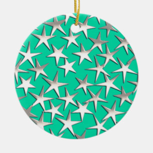 Zilveren sterren op turquoise keramisch ornament