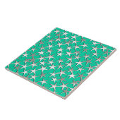 Zilveren sterren op turquoise tegeltje (Zijkant)