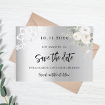 Zilveren witte bloemen kant verjaardag save the date<br><div class="desc">Een moderne en elegante Save the Date voor een 50e verjaardagsfeestje. Een faux zilveren achtergrond,  versierd met witte bloemen en witte kant. Personaliseer en voeg een datum en naam toe. De tekst: Save the Date is geschreven met een groot trendy handgeschreven stijlscript.</div>