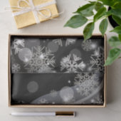 Zilversneeuwvlokken en -lichten op zwart tissuepapier (Geschenk)