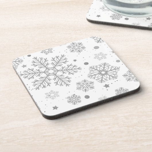 Zilversneeuwvlokken op wit bier onderzetter (Linkerzijde)