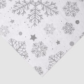 Zilversneeuwvlokken op wit tissuepapier (Detail)