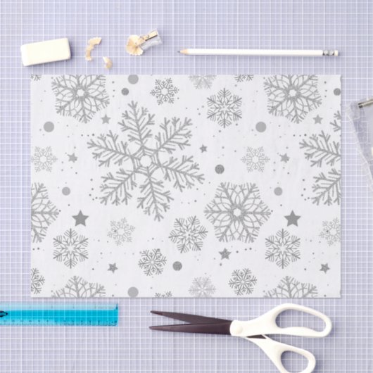 Zilversneeuwvlokken op wit tissuepapier (Craft)