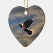 Zingraven tijdens de vlucht keramisch ornament (Links)