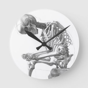 Zittend  skelet denken ronde klok