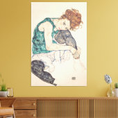 Zittende vrouw met hoofd op knie canvas afdruk (Insitu (Woonkamer))