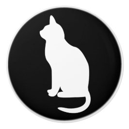 Zittende witte kat naar links gericht keramische knop