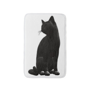 Zittende zwarte kat badmat