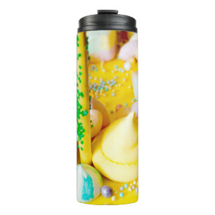 Zoete gebak marshmallow lollipop, lichtgeel blauw thermosbeker