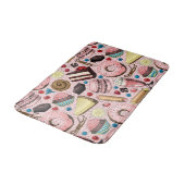 Zoete lekkernijen op roze badmat (Gekanteld)