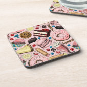 Zoete lekkernijen op roze bier onderzetter (Linkerzijde)