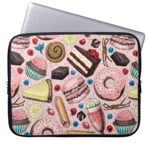 Zoete lekkernijen op roze laptop sleeve