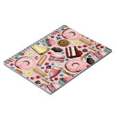 Zoete lekkernijen op roze notitieboek (Linkerzijde)