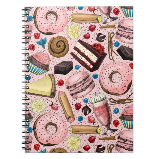 Zoete lekkernijen op roze notitieboek (Voorkant)