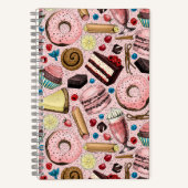 Zoete lekkernijen op roze notitieboek (Voorkant)