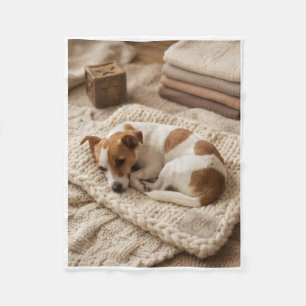 Zoete slapende puppy op rustieke deken vacht deken