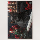 Zoete zwarte kat liggend op piano legpuzzel (Verticaal)