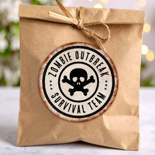 Zombie overlevingsteam met schedel ronde sticker