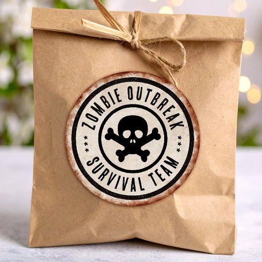 Zombie overlevingsteam met schedel ronde sticker