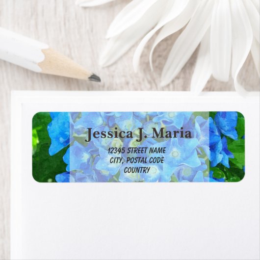 zomerblauwe hydrangebloemen en groene bladeren etiket (Insitu)