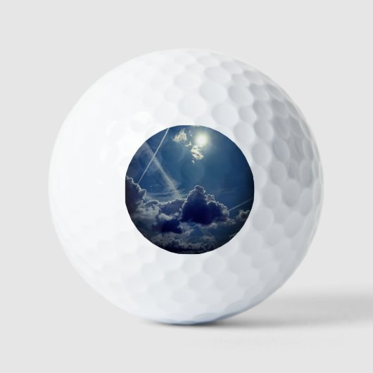 Zon achter de wolken golfballen (Voorkant)
