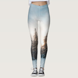 Zon achter spruce-bomen leggings