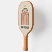Zon boven een regenboog pickleball paddle (Links)