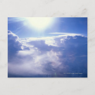 Zon door wolken heen briefkaart