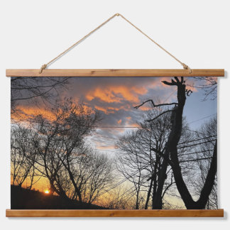 Zon komt op hangend wandkleed