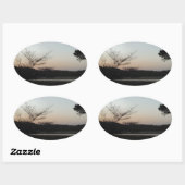 Zon plaatsen, rijzende maan boven Arrowiad Ovale Sticker (Vel)