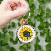 Zonnebloem en blauwe vlinder sleutelhanger (Hand)