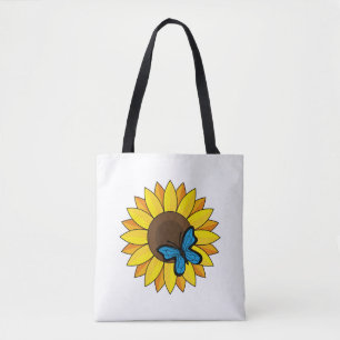 Zonnebloem en blauwe vlinder tote bag